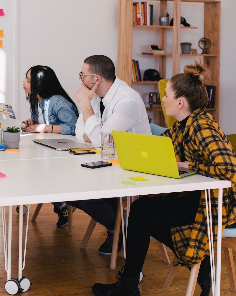 A small team working together around one table